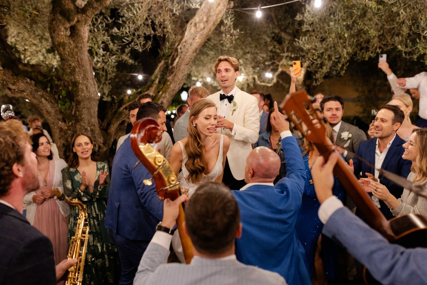 A wedding celebration under the olive trees